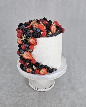 Tall Cake Designed with Berries and Stencil Art Elegant Tall Cake From Fancy Cakes Menu, Designed with Berry Decorations and Stencil Art